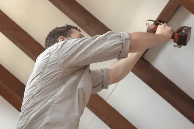 Electricians in Brisbane installing and replacing power points and switches